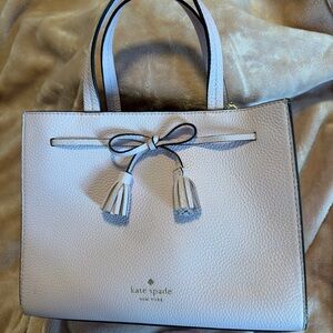 Kate Spade ♠️ Light Pink Hayes Pebbled Leather Satchel with Tassel Bow